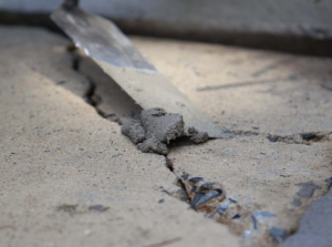 how to repair cracks and damage in your colorado concrete driveway